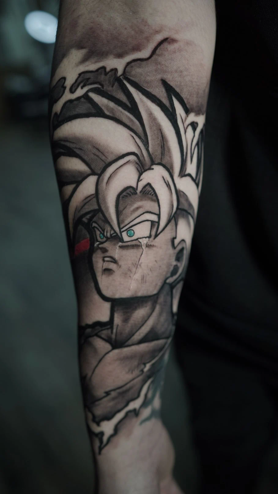 Anime style forearm tattoo with black and gray warrior by RCD Ink Tacoma